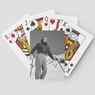 Woman Skier Playing Cards