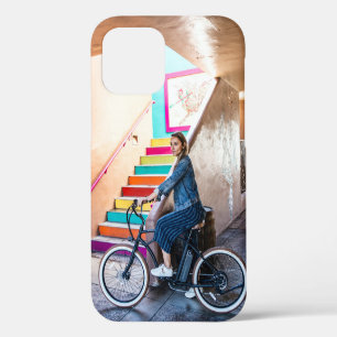Woman wearing blue denim jacket and shorts riding iPhone 12 case