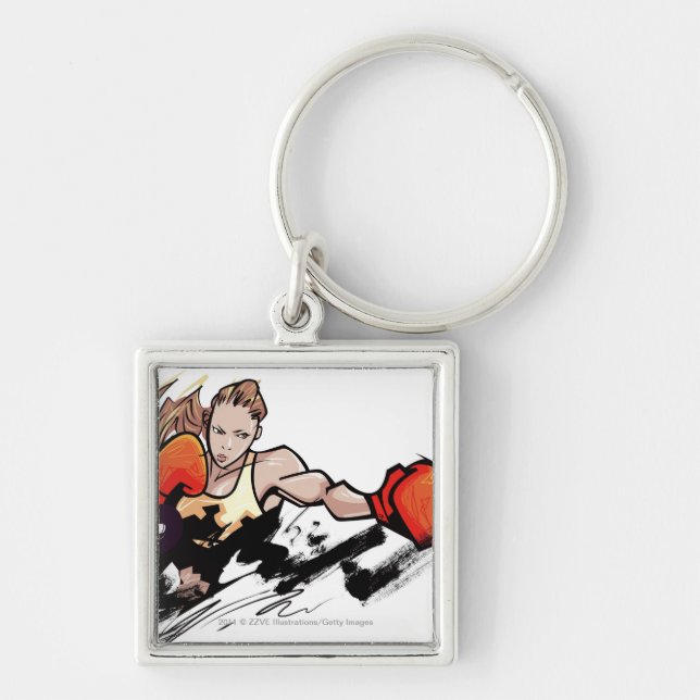 Woman wearing boxing glove key ring (Front)