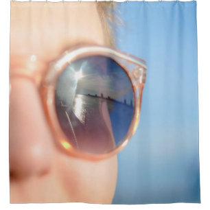 Woman wearing brown framed sunglasses shower curtain