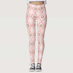 Woman wearing white leggings with a pink and red