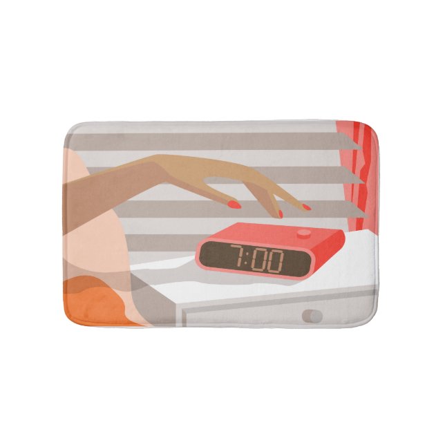 Womans hand pushing on alarm clock snooze button bath mat (Front)