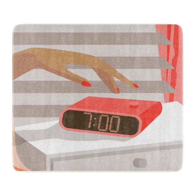 Womans hand pushing on alarm clock snooze button cutting board (Front)