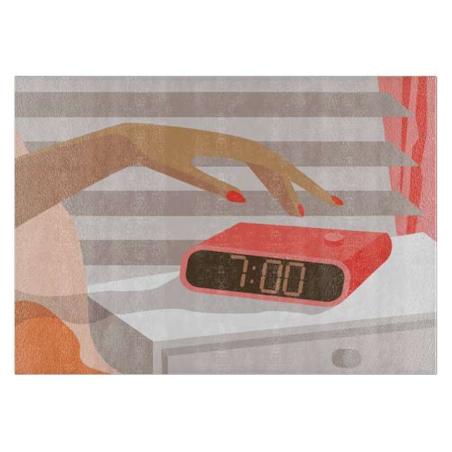 Womans hand pushing on alarm clock snooze button cutting board (Front)