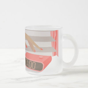 Womans hand pushing on alarm clock snooze button frosted glass coffee mug
