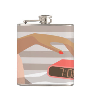 Womans hand pushing on alarm clock snooze button hip flask
