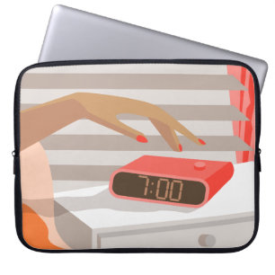 Womans hand pushing on alarm clock snooze button laptop sleeve