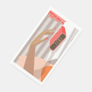 Womans hand pushing on alarm clock snooze button napkin