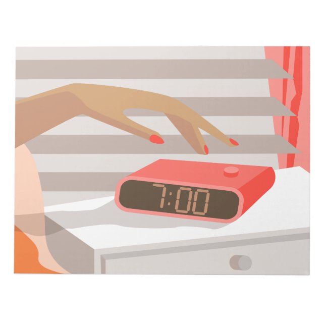 Womans hand pushing on alarm clock snooze button notepad (Front)