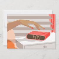 Womans hand pushing on alarm clock snooze button