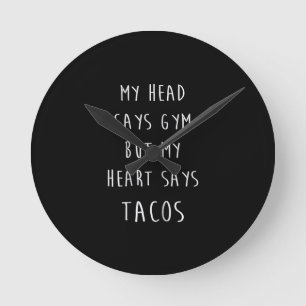 Women My Head Says Gym But My Heart Says Tacos Round Clock