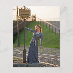 Women on the tram stop postcard