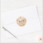 Wood Disc Background Rustic Wedding Monogram Classic Round Sticker<br><div class="desc">Capture the rustic charm of your upcoming wedding with this Personalised Wood Disc Background Rustic Wedding Monogram Sticker. Featuring a woodcut background with rings, this sticker allows you to add a personal touch by customising it with your own name initials. The round shape and wood print of this sticker evoke...</div>