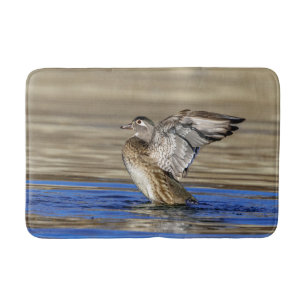 Wood Duck flapping her wings Bath Mat