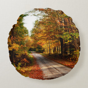 Wood trail with fall foliage round cushion