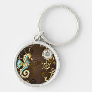 Wooden Background with Mechanical Seahorse Key Ring
