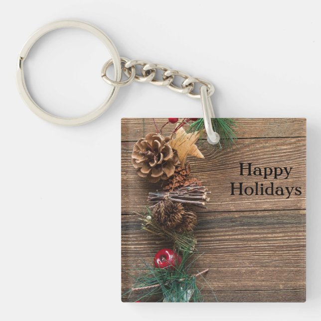 wooden background with pine cones      key ring (Front)