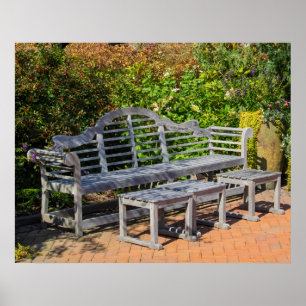 Wooden Bench in Lush Garden Poster
