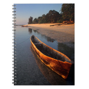 Wooden boats on Tondooni Beach Spiral Notebook