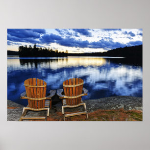 Wooden Chairs At Sunset On Lake Shore Poster