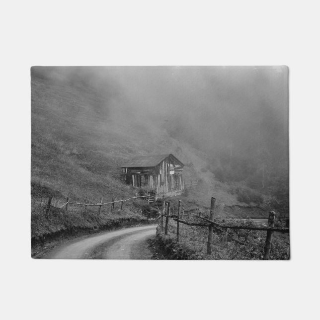 Wooden hut in nature/fog at mountain doormat (Front)