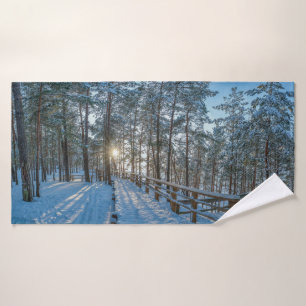 Wooden path across snowy winter forest bath towel