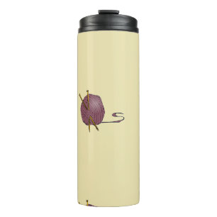 Wool knitting on brown thermal tumbler