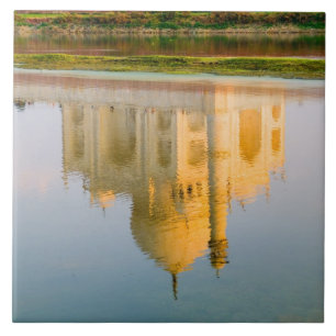 World famous Taj Mahal temple reflection at Tile
