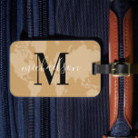 World Traveller Cognac Map Custom Monogram Name Lu Luggage Tag<br><div class="desc">Travel the world in style! This elegant and modern luggage tag features a cognac tan brown map of the world background with black and white custom monogram that can be personalised with your first or last name and initial letter.</div>