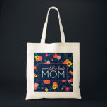 World's Best Mum Gift Floral Blue Pink Tote Bag<br><div class="desc">Tell the mother in your life that she's the best with this modern floral grocery bag with flowers and leaves in blue,  coral,  yellow and pink and the phrase "world's best mum". Text is customisable. Perfect for Mother's Day,  birthdays and more. Part of a collection from Parcel Studios.</div>