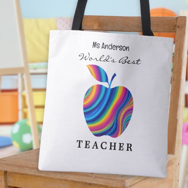 World's Best Teacher Rainbow Apple Custom Name Tote Bag (A tote bag with 'World's Best Teacher' words, colorful apple picture and teacher's name)