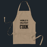 World's okayest cook | Funny bbq apron for men<br><div class="desc">World's Okayest cook | Funny bbq apron for men. Barbecue gift for men. Cute Birthday gift idea for dad,  uncle,  grandpa,  brother,  husband,  son etc. Barbeque aprons in beige yellow and white. Vintage typography.</div>
