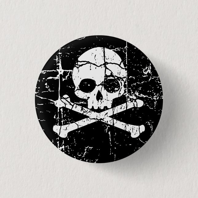 Worn Cracked Skull and Crossbones Button (Front)