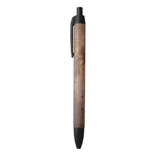 Worn pine board black ink pen