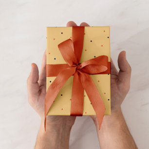 Wrapping paper with dots on orange