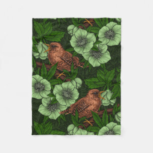 Wren and hellebore on dark green fleece blanket