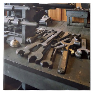 Wrenches and Oil Can in Machine Shop Tile