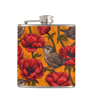 Wrens in a red anemone garden hip flask