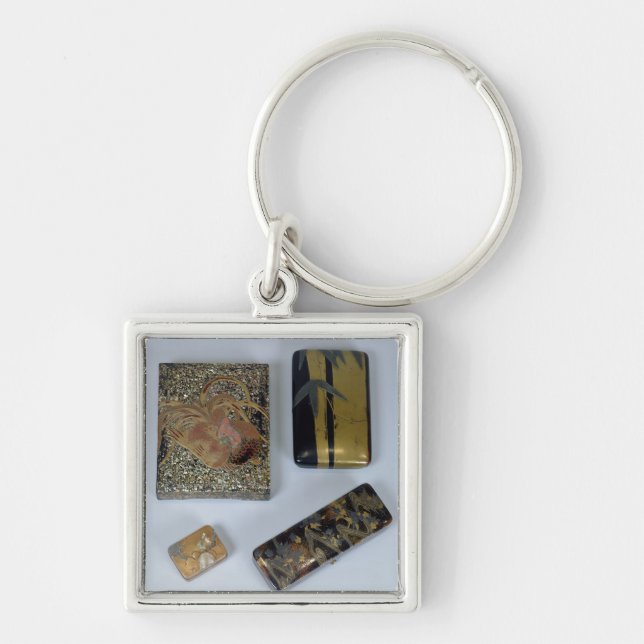 Writing case decorated with a cockerel key ring (Front)