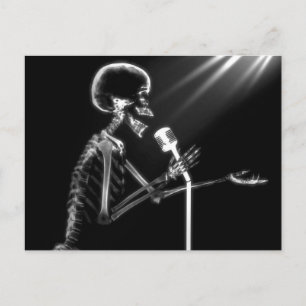 X-RAY SKELETON SINGING ON RETRO MIC - B&W POSTCARD