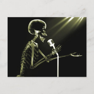 X-RAY SKELETON SINGING ON RETRO MIC - YELLOW POSTCARD