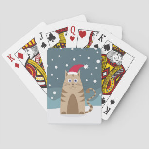 Xmas cat wearing santa hat  playing cards