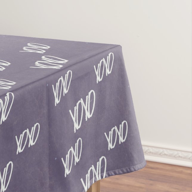 Xoxo handwriting on grey tablecloth (In Situ)