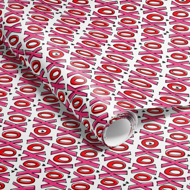 XOXO Valentine's Day Wrapping Paper (pink and red XOXOs and tiny hearts bring all the love vibes to this Valentine's Day gift wrap paper)