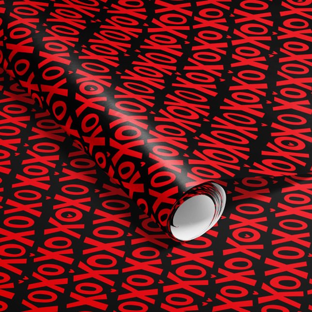 XOXO Valentine's Day Wrapping Paper (Valentine's Day wrapping paper roll with red XOXOs on black and tiny heart details)