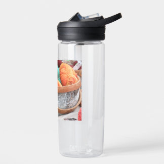 Yarn in birch bark basket water bottle