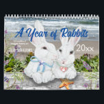 Year of Rabbit Bunny Cute Nature Woodland Art Calendar<br><div class="desc">This whimsical calendar celebrates rabbits with 12 colourful artistic scenes of cute bunny rabbit couples enjoying each month's festivities. Perfect for the Year of the Rabbit, 2023! Snuggle bunny companions in winter snow, in flower gardens, in woodland settings, enjoying time at the sea coast, in a pumpkin patch, and in...</div>