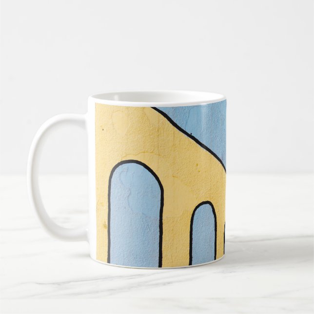 Yellow and blue wall décor coffee mug (Left)