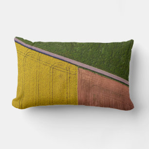 Yellow and brown textile lumbar cushion