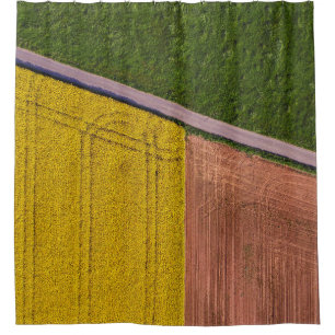 Yellow and brown textile shower curtain